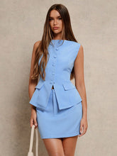 Completo top smanicato e minigonna