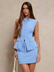 Completo top smanicato e minigonna