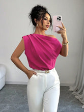 Top asimmetrico drappeggiato