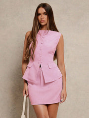 Completo top smanicato e minigonna