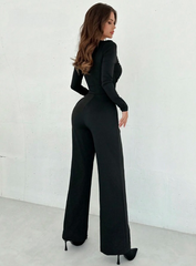 Tuta con cut out e fiorellini dorati